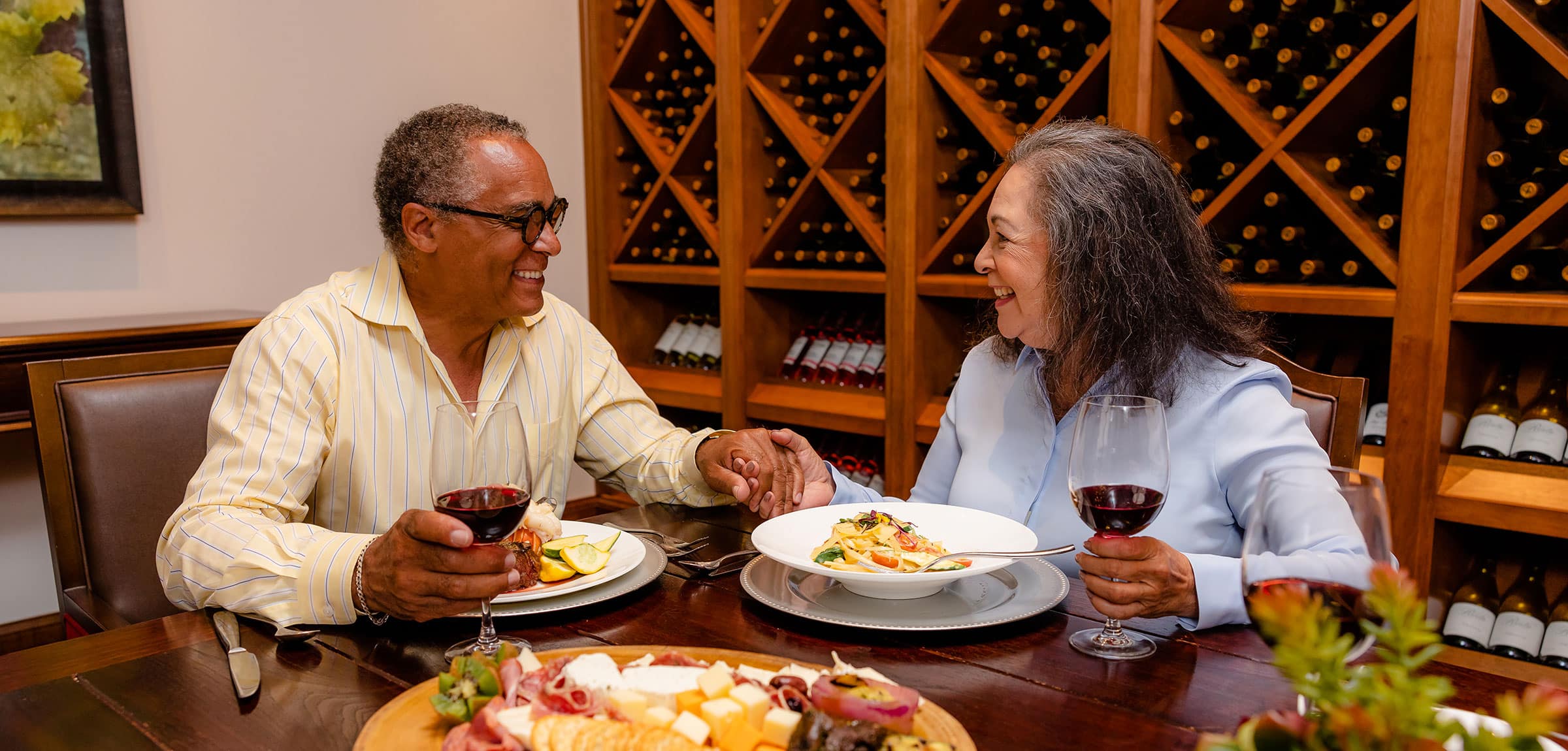 lacosta-2024-600x600-26 A mature couple dining in the private wine room.